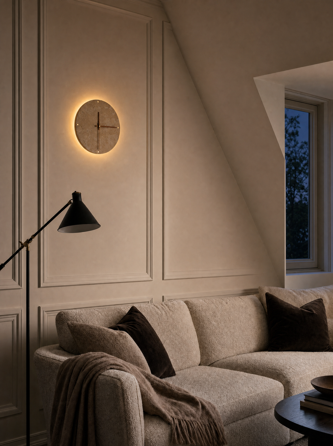 Adagio travertine wall clock with the wall light on