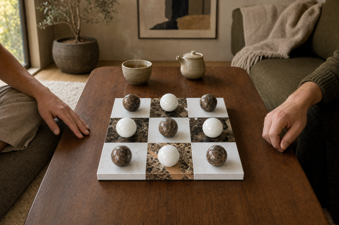 A game of tic-tac-toe underway on the Lapilli board