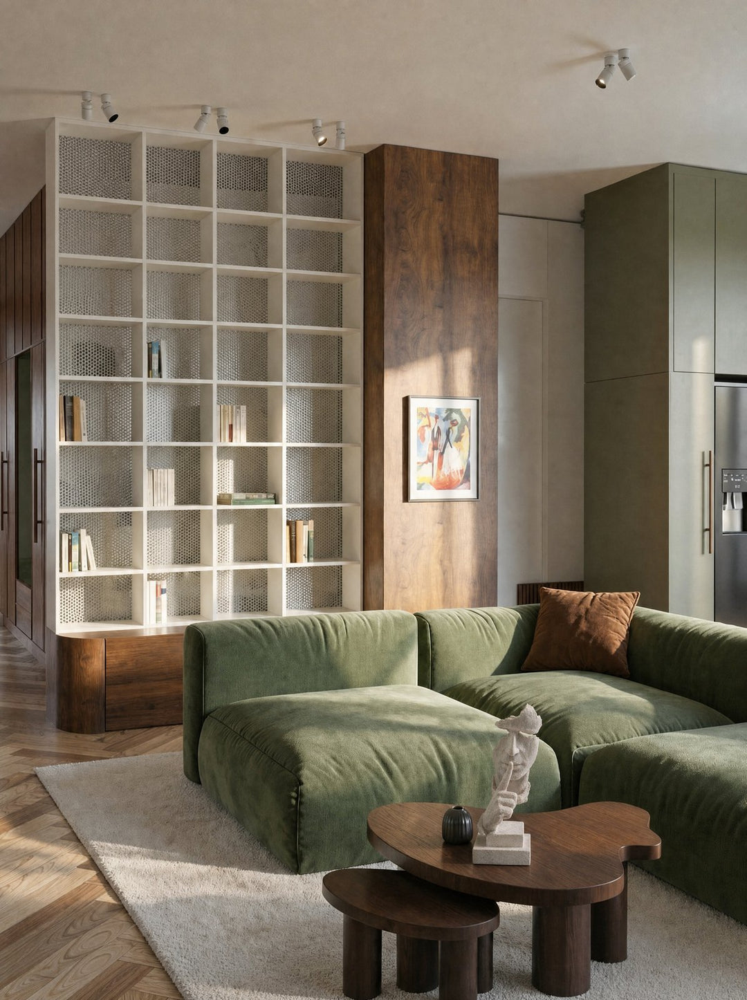 SilentMuse, a figure with a sealed face and one finger to its lips, on a round walnut side table beside a moss green velvet sofa, in front of a white grid shelving wall