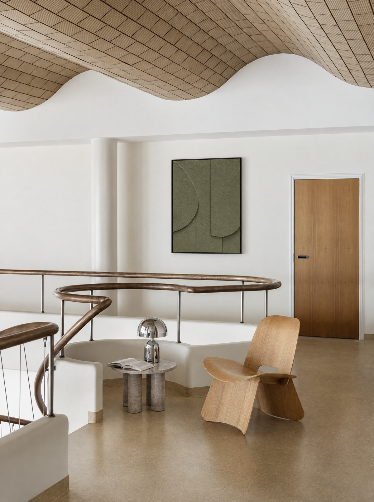 Tinta in Oliva hung on a white mezzanine wall above a curved railing, under a wavy ceiling