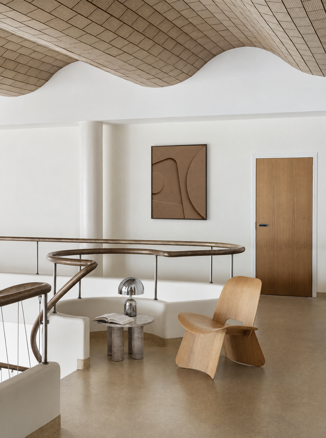 Tinta in Argilla hung on a white mezzanine wall beside a door, above a curved railing