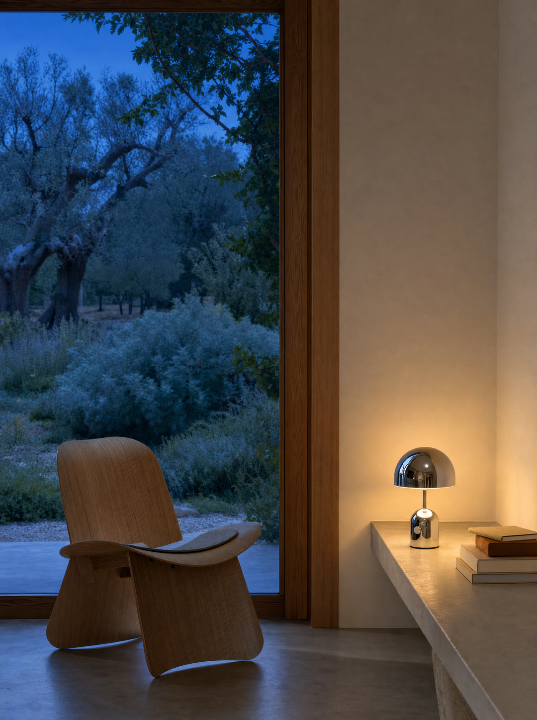 Vespers cordless table lamp on a table at the evening hour